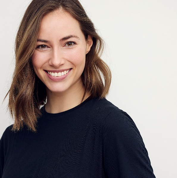 woman smiling with a dental bridge in Jacksonville