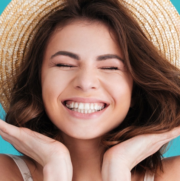 Woman showing off smile after gum recontouring