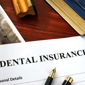 dental insurance form on table
