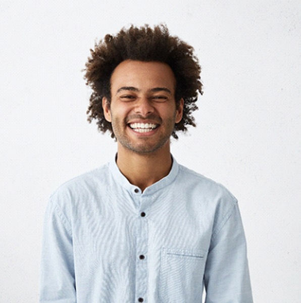 Man with dental crown in Jacksonville smiling