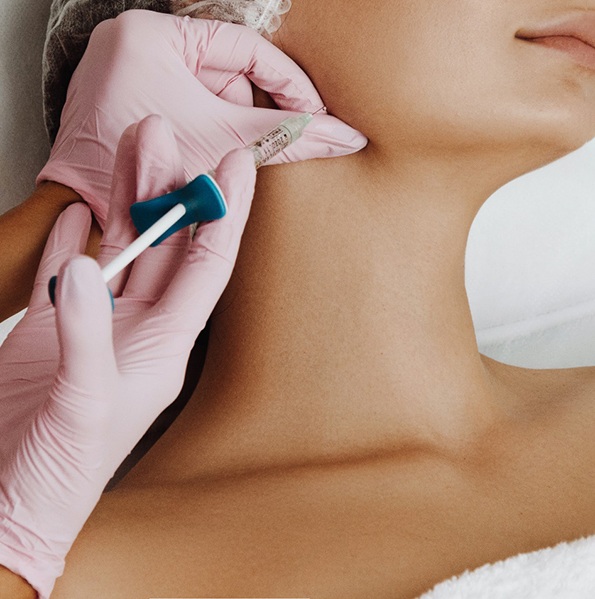 young woman getting dermal fillers