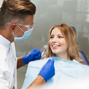 woman seeing her implant dentist in Jacksonville for a checkup 