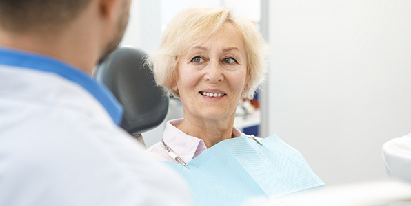 patient visiting dentist for implant consultation 