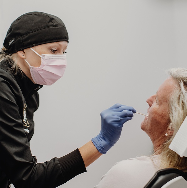 Patient receiving fluoride treatment