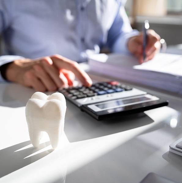 man calculating cost of veneers in Jacksonville