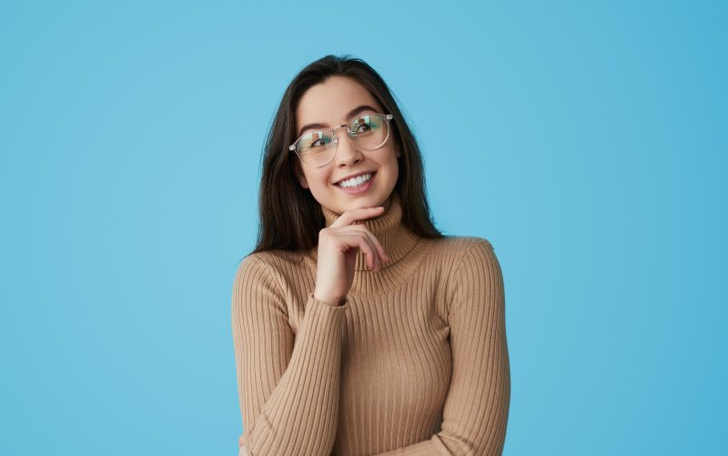 woman smiling and wondering