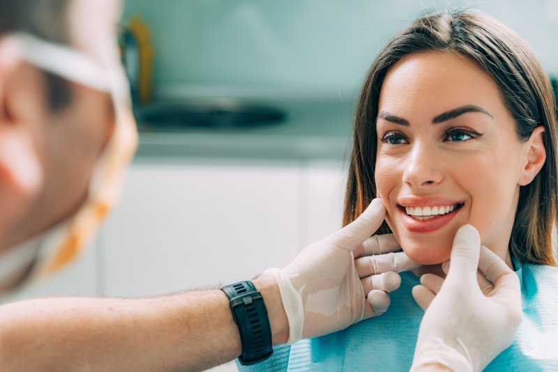 Woman smiling at dentist